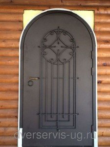Арочные стальные двери с ковкой